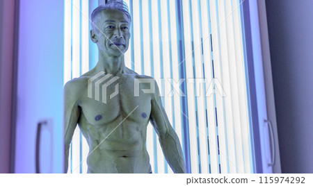 Tanning salon senior man 115974292