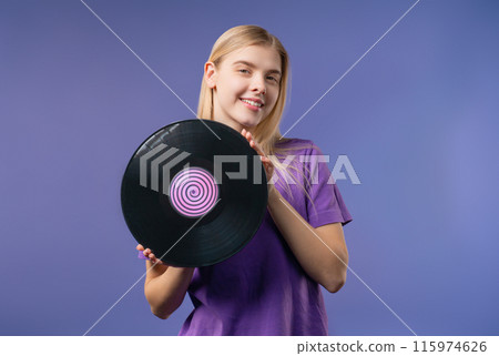 Young Blonde Woman With Vinyl Record Disc. Hobby, Music Lover, Collection Young Blonde Woman With Vinyl Record Disc. Hobby, Music Lover, Collection 115974626
