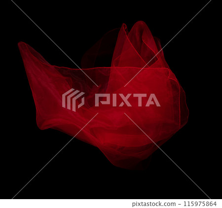 Red organza fabric flying in curve shape, Piece of textile Red organza fabric throw fall in air. Black background isolated, dark shading environment 115975864