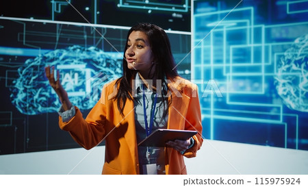 Public speaker doing presentation at tech forum event, explore ways emerging AI technologies can positively enhance companies workforce. Indian woman promoting artificial intelligence solutions 115975924