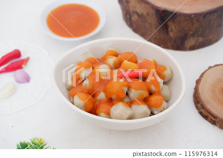 small meatballs with sauce as a background 115976314