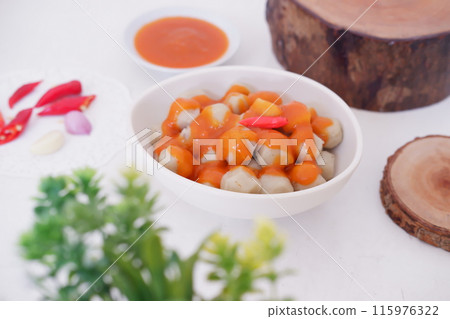 small meatballs with sauce as a background 115976322