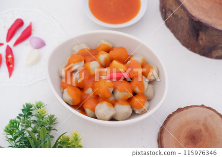 small meatballs with sauce as a background 115976346