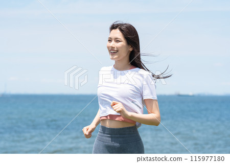 Young woman jogging on the seaside Young woman jogging on the seaside 115977180