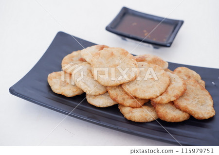 french fries in round slices as a background 115979751