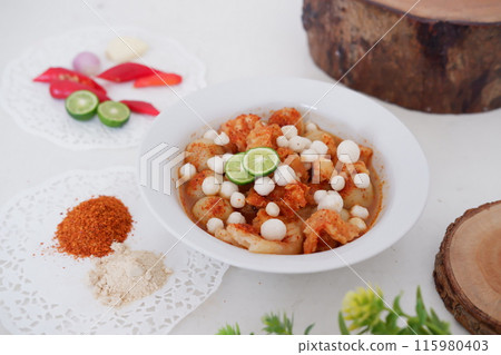 Meatballs with Peanut Crackers as a Background Meatballs with Peanut Crackers as a Background 115980403