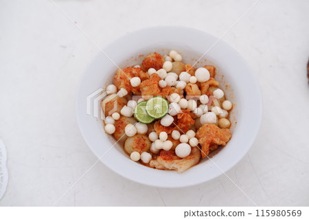 Meatballs with Peanut Crackers as a Background Meatballs with Peanut Crackers as a Background 115980569