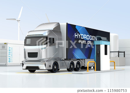 一輛FCV卡車在加氫站加註氫氣。背景是風力發電機、氫氣罐和貨櫃蓄電池。 一輛FCV卡車在加氫站加註氫氣。背景是風力發電機、氫氣罐和貨櫃蓄電池。 115980753