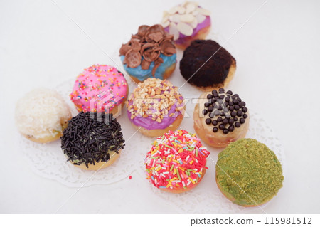 ball donuts with various flavors as a background 115981512
