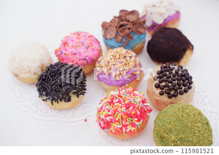 ball donuts with various flavors as a background ball donuts with various flavors as a background 115981521