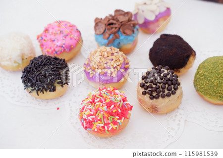 ball donuts with various flavors as a background 115981539