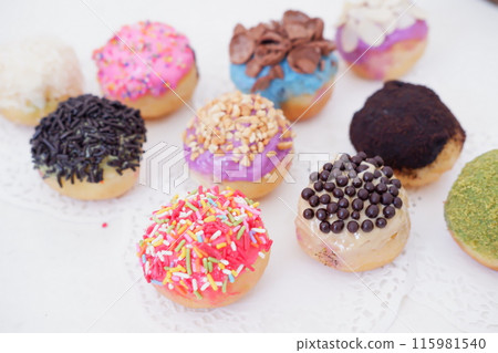 ball donuts with various flavors as a background ball donuts with various flavors as a background 115981540