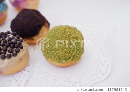 ball donuts with various flavors as a background 115981543