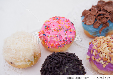 ball donuts with various flavors as a background 115981546