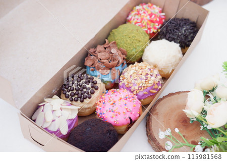 ball donuts with various flavors as a background 115981568