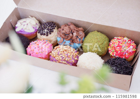ball donuts with various flavors as a background ball donuts with various flavors as a background 115981598
