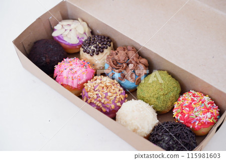 ball donuts with various flavors as a background 115981603
