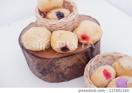 flavored ball donuts as a background flavored ball donuts as a background 115982100