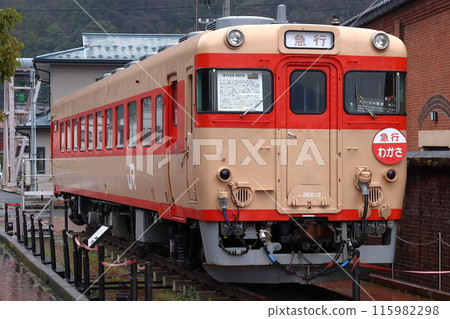 Kiha 28 series locomotive parked next to the - Stock Photo