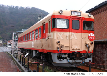 Kiha 28 series locomotive parked next to the - Stock Photo