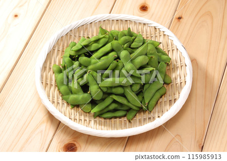 Fresh edamame beans served in a colander Fresh edamame beans served in a colander 115985913