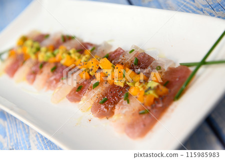 FISH CEVICHE RECIPE, SEA BREAM AND TUNA, AVOCADO, BELL PEPPER, CHILLI, CHIVES, LEMON, OLIVE OIL FISH CEVICHE RECIPE, SEA BREAM AND TUNA, AVOCADO, BELL PEPPER, CHILLI, CHIVES, LEMON, OLIVE OIL 115985983