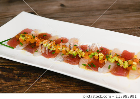 FISH CEVICHE RECIPE, SEA BREAM AND TUNA, AVOCADO, BELL PEPPER, CHILLI, CHIVES, LEMON, OLIVE OIL FISH CEVICHE RECIPE, SEA BREAM AND TUNA, AVOCADO, BELL PEPPER, CHILLI, CHIVES, LEMON, OLIVE OIL 115985991