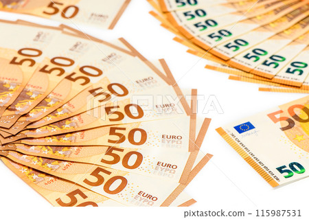 50 euro bills spread out in the shape of a fan. Isolated on white background. 115987531