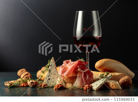 Red wine with traditional Mediterranean snacks. 115989033