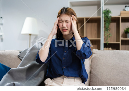 Woman feeling sick and headache, health care concept. 115989084