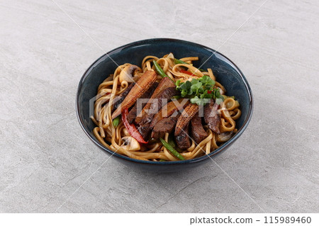 Udon with beef and teriyaki sauce 115989460