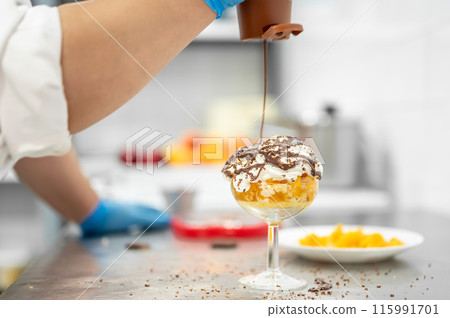 chef preparing a delicious dessert 115991701