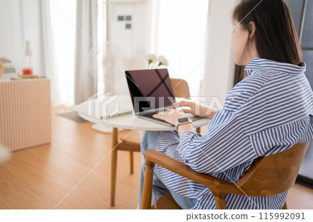 asian woman freelancer relax and happy during working from home asian woman freelancer relax and happy during working from home 115992091