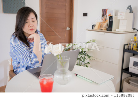 asian woman freelancer relax and happy during working from home asian woman freelancer relax and happy during working from home 115992095