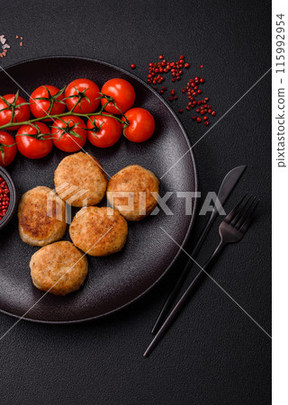 Delicious fresh fried minced fish cutlets with spices and herbs Delicious fresh fried minced fish cutlets with spices and herbs 115992954