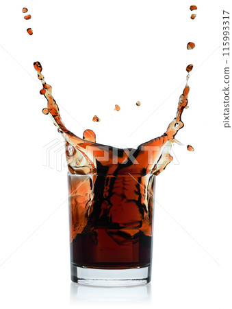 Splash in glass with cola beverage, isolated on white background, summer beverages concept Splash in glass with cola beverage, isolated on white background, summer beverages concept 115993317