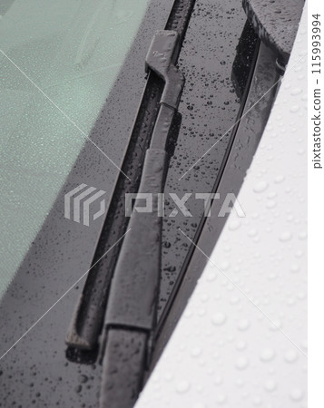 Car wipers on a rainy day 115993994