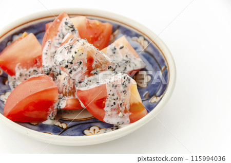Tomato salad with black sesame mayonnaise 115994036