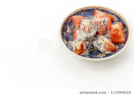 Tomato salad with black sesame mayonnaise 115994038