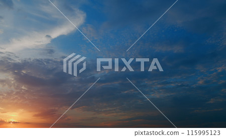 Sky different shades sunset. Dramatic blue, colorful clouds. Sunset sky with clouds background. Timelapse. Sky different shades sunset. Dramatic blue, colorful clouds. Sunset sky with clouds background. Timelapse. 115995123