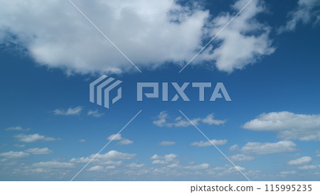 Sky after the storm. Majestic amazing blue sky with stratocumulus clouds. Nature cumulus clouds moving. Timelapse. Sky after the storm. Majestic amazing blue sky with stratocumulus clouds. Nature cumulus clouds moving. Timelapse. 115995235