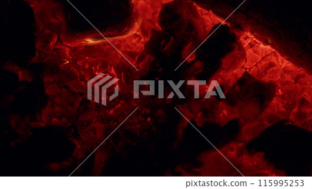 Natural wooden fire for bbq. Blazing tree and embers in an open air. Close up. Natural wooden fire for bbq. Blazing tree and embers in an open air. Close up. 115995253