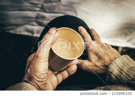Crop senior man with paper cup of drink Crop senior man with paper cup of drink 115996320