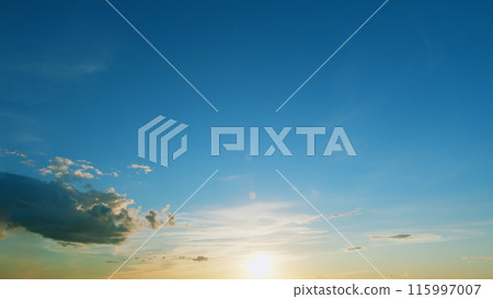 Orange sky with clouds and rays of the sun, clouds at sunset. Sunset clouds epic cloudscape nature view. Timelapse. Orange sky with clouds and rays of the sun, clouds at sunset. Sunset clouds epic cloudscape nature view. Timelapse. 115997007