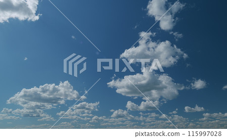 Large dark cumulus cloud in blue sky. Epic dramatic storm dark grey and white cumulus rain clouds. Timelapse. Large dark cumulus cloud in blue sky. Epic dramatic storm dark grey and white cumulus rain clouds. Timelapse. 115997028