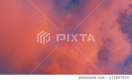 Sky different shades sunset. Dramatic blue, colorful clouds. Sunset sky with clouds background. Timelapse. 115997054