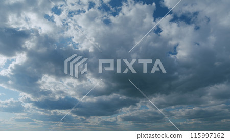 Sky with bautiful silky clouds. Puffy fluffy stratocumulus and stratus clouds. Timelapse. Sky with bautiful silky clouds. Puffy fluffy stratocumulus and stratus clouds. Timelapse. 115997162