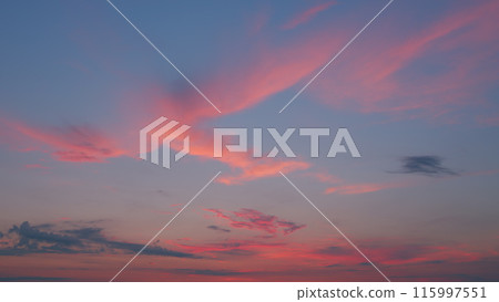 Dramatic sunset. Bright sun light ray and sunbeams. Evening time. Timelapse. 115997551