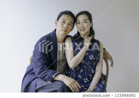 Middle-aged man and woman portraits Middle-aged man and woman portraits 115998892