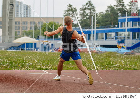 thrower athlete javelin throw at summer athletics games 115999864